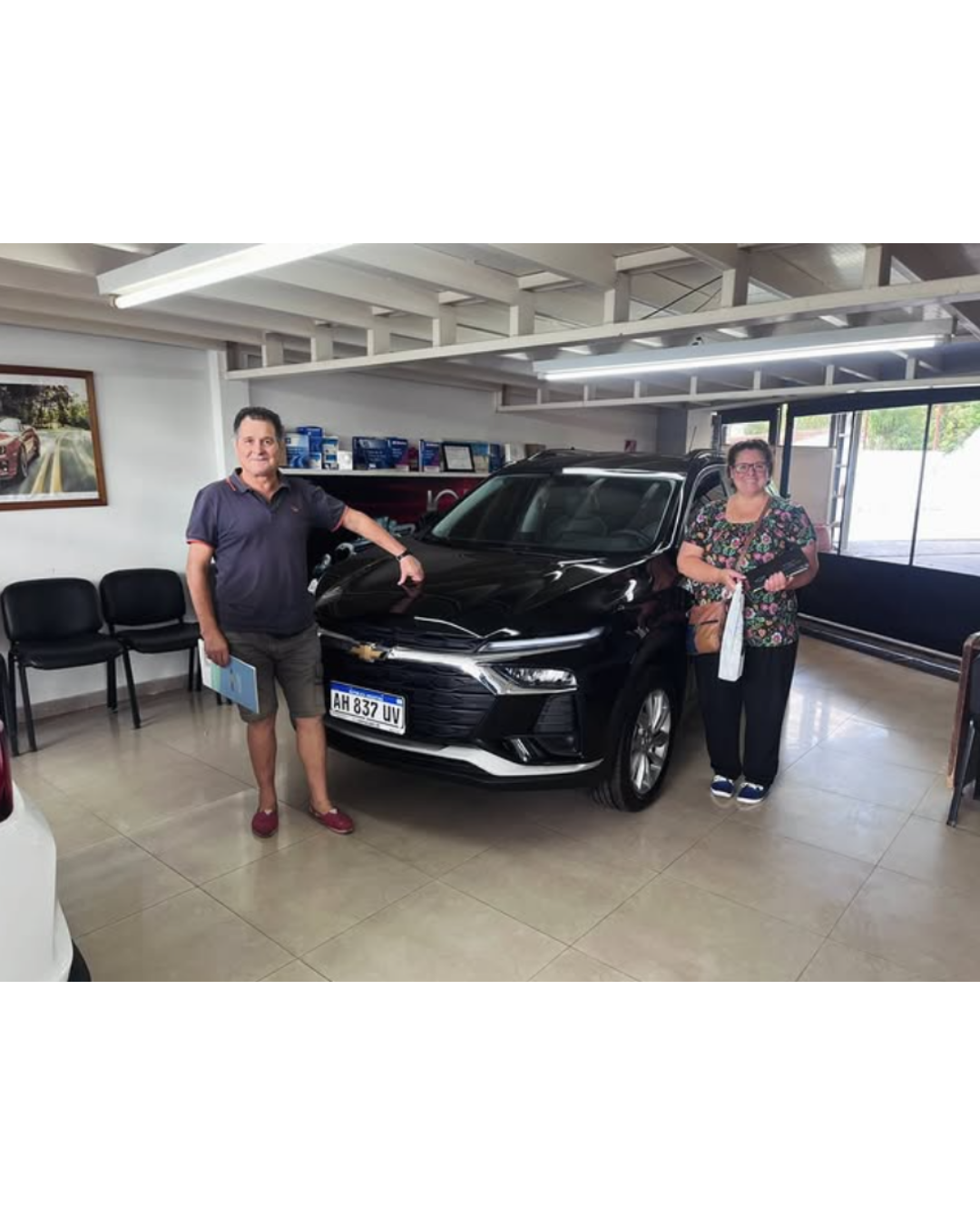 Clientes de Expocart con su auto nuevo